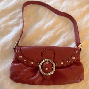 Studded red handbag/clutch. Vegan leather with silver metal accents.